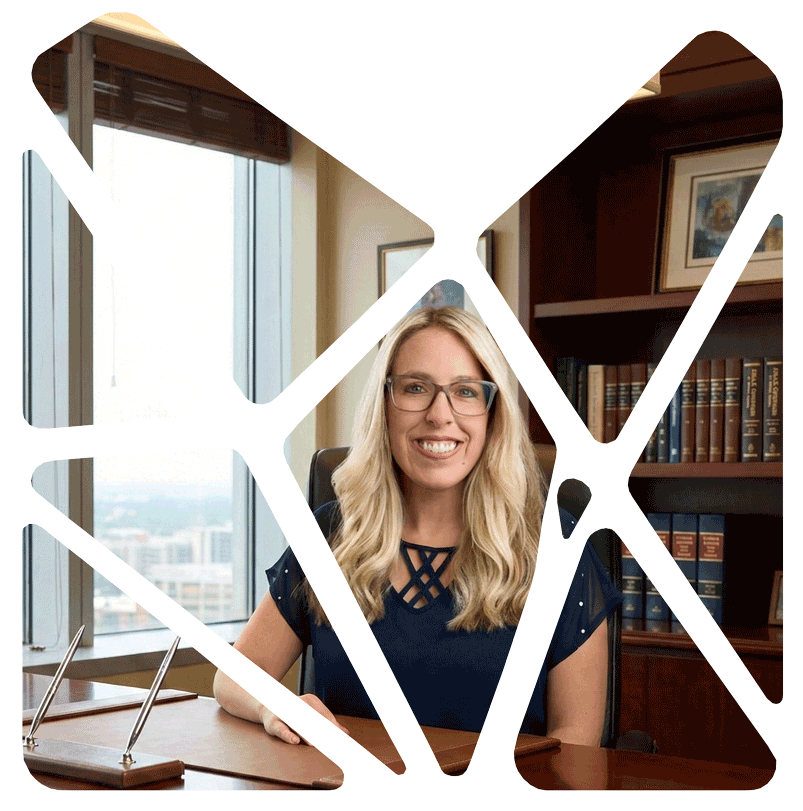 Portrait of the founder of mosAIc operations, Mandy Shaffer, framed within the company logo, seated at a conference table in a professional office setting.